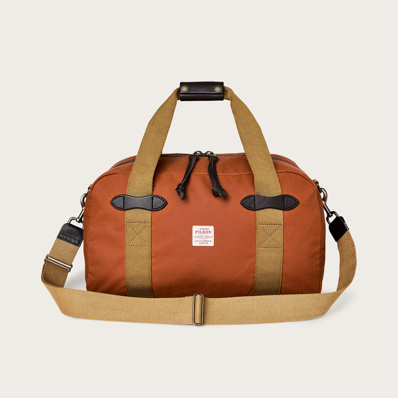 Tin cloth small duffle bag par Filson | Rust (Red)