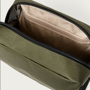 All-weather travel pack by Filson | Olive / black / cove (Green)
